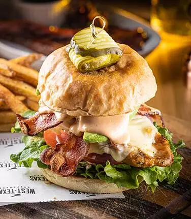 West Texas Chophouse - CHIPOTLE AVOCADO CHICKEN SANDWICH